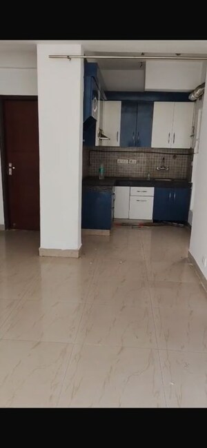 Kitchen in 2 BHK Apartment at Nimbus The Golden Palm, Sector 168 – for Rent