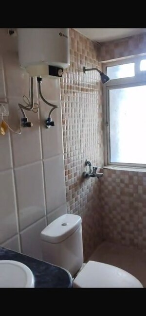 Bathroom in 2 BHK Apartment at Nimbus The Golden Palm, Sector 168 – for Rent