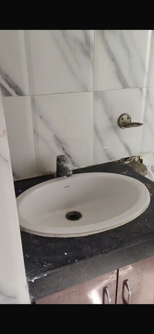Bathroom in 2 BHK Apartment at Nimbus The Golden Palm, Sector 168 – for Rent