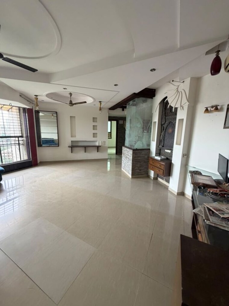 Living Room, nirmal-city-of-joy-chs-ltd 2 Bedroom 999 Sq.Ft. Apartment In Mulund West Mumbai 10763027