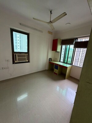 Master Bedroom in 2 BHK Apartment at Nirmal City Of Joy CHS Ltd, Mulund West – for Rent
