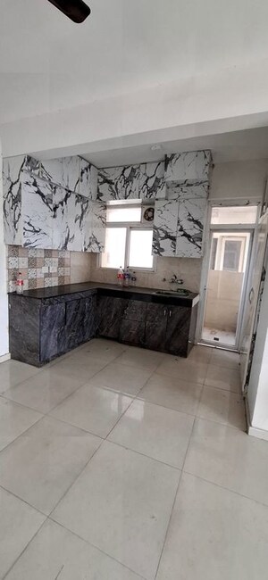 Kitchen in 2 BHK Apartment at Signature Global The Millennia, Sector 37d – for Rent
