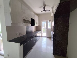 Kitchen in 3 BHK Apartment at Paramount Floraville, Sector 137 – for Sale
