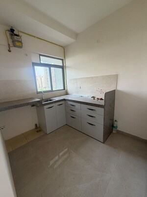 Kitchen in 1 BHK Apartment at Piramal Vaikunth A Class Homes, Balkum Pada – for Rent
