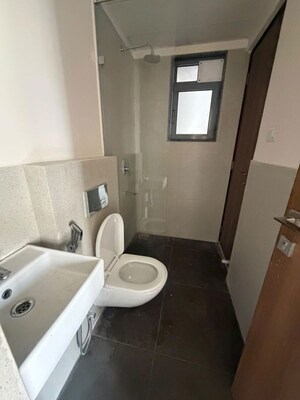 Bathroom in 1 BHK Apartment at Piramal Vaikunth A Class Homes, Balkum Pada – for Rent