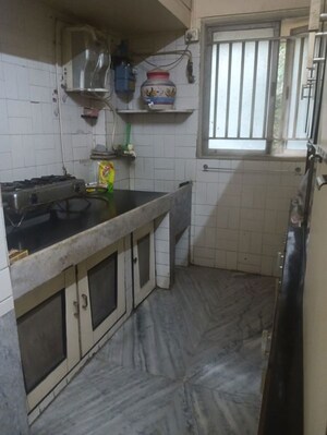 Kitchen in 2 BHK Apartment at Mantri Park, Goregaon East – for Rent