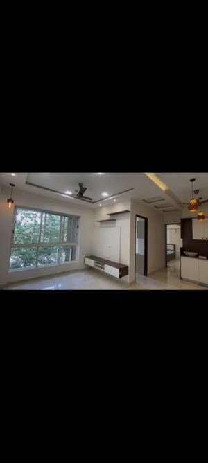 Living Room in 1 BHK Apartment at Lodha Amara Tower 44, Kolshet Road – for Rent