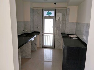Kitchen in 3 BHK Apartment at Ruparel Millennia, Parel – for Sale