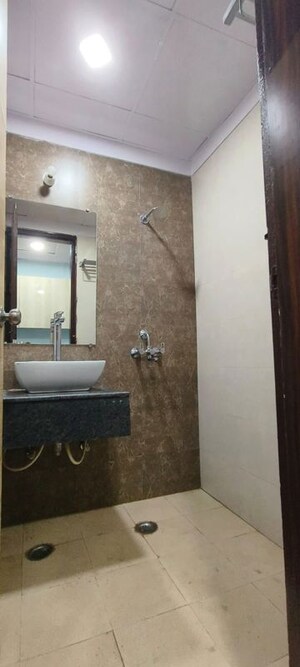 Bathroom in Studio Apartment at Gaur City Mall, Sector 4 Greater Noida – for Sale