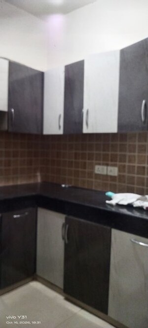 Kitchen in 2.5 BHK Apartment at Mahagun My Woods, Sector 16c Greater Noida – for Rent