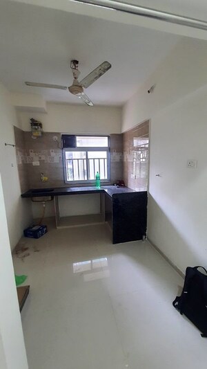 Kitchen in 2 BHK Apartment at Om Ashoka Heights, Mulund West – for Rent