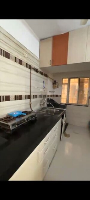 Kitchen in 2 BHK Apartment at GK Rose Icon, Pimple Saudagar – for Sale