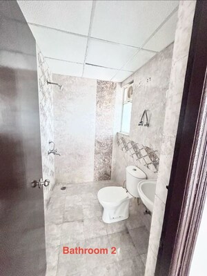 Bathroom in 2 BHK Apartment at Migsun Roof, Raj Nagar Extension – for Sale