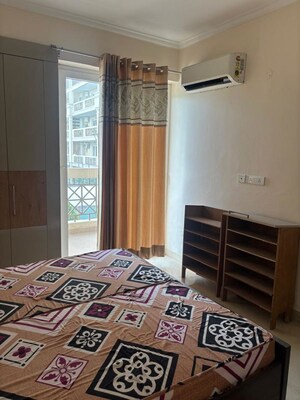 Bedroom in 3 BHK Apartment at Affinity Greens, International Airport Road – for Rent
