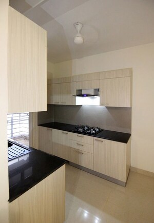 Kitchen in 4 BHK Apartment at Adani Samsara Vilasa, Sector 63 – for Sale