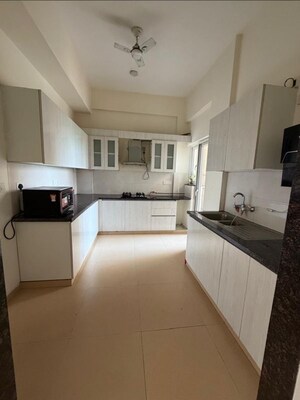 Kitchen in 4 BHK Apartment at Adani Samsara Vilasa, Sector 63 – for Sale