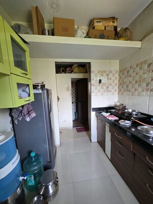 Kitchen in 1 BHK Apartment at Piramal Vaikunth, Balkum Pada – for Rent