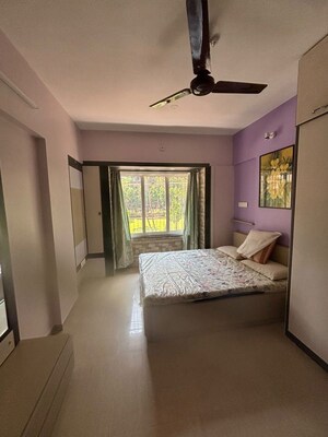 Bedroom in 2 BHK Apartment at Vasant Prakash CHS, Versova – for Rent