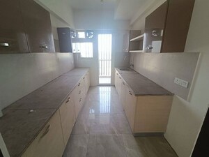 Kitchen in 4 BHK Apartment at ATS Golf Meadows, Central Derabassi – for Rent
