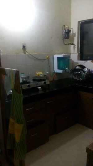 Kitchen in 2 BHK Apartment at Rose Garden, Viman Nagar – for Rent