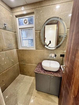 Bathroom in 3 BHK Builder Floor at Sushant Lok I – for Rent