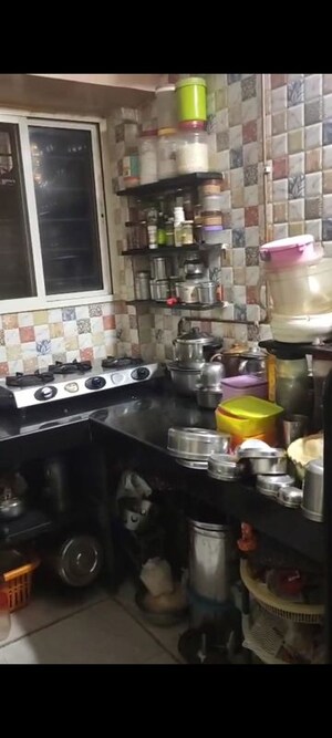 Kitchen in 1.5 BHK Apartment at Ganga Puram CHS, Viman Nagar – for Rent