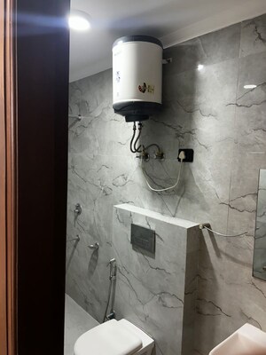 Bathroom in 2 BHK Builder Floor at Freedom Fighters Enclave – for Rent