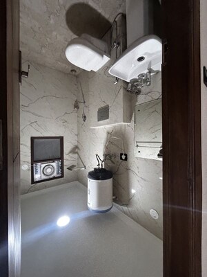 Bathroom in 2 BHK Builder Floor at Freedom Fighters Enclave – for Rent