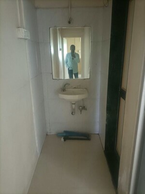 Bathroom in 1 BHK Apartment at Akanksha Residency, Aundh – for Rent