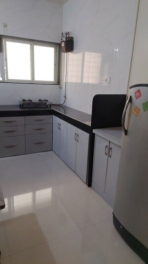 Kitchen in 2.5 BHK Apartment at Yash Sankul, Pimple Saudagar – for Rent