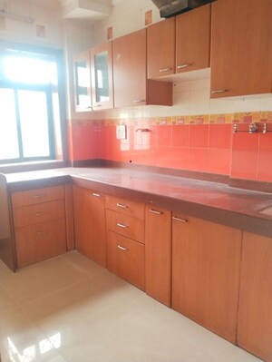 Kitchen in 2 BHK Apartment at City Park CHS, Khanda Colony – for Rent
