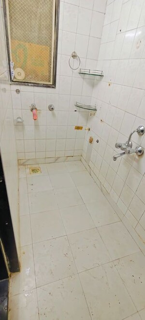 Bathroom in 3 BHK Apartment at Paresh Apartment, Borivali West – for Rent