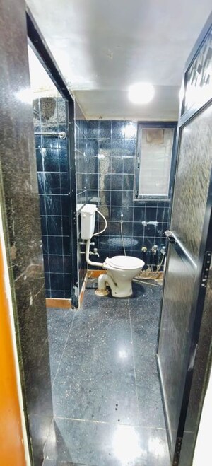 Bathroom in 3 BHK Apartment at Paresh Apartment, Borivali West – for Rent