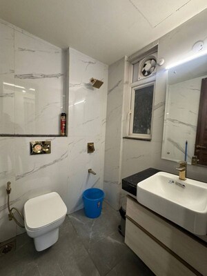 Bathroom in 3 BHK Apartment at Smart World Orchard, Sector 61 – for Rent