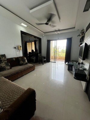 Living Room in 2 BHK Apartment at Welworth Tinseltown, Bavdhan – for Rent