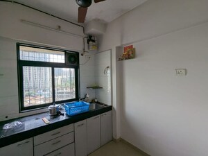 Kitchen in 1 BHK Apartment at Raunak Heights, Ghodbunder Road – for Rent