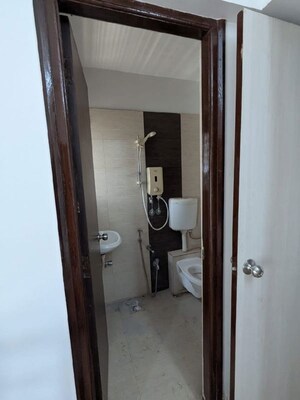 Bathroom in 1 BHK Apartment at Raunak Heights, Ghodbunder Road – for Rent