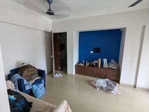 Living Room in 1 BHK Apartment at Raunak Heights, Ghodbunder Road – for Rent