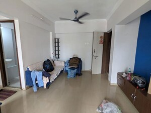 Living Room in 1 BHK Apartment at Raunak Heights, Ghodbunder Road – for Rent