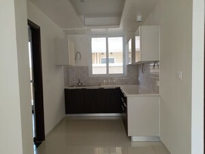 Kitchen in 4 BHK Builder Floor at BPTP Parkland Pride, Sector 77 – for Sale
