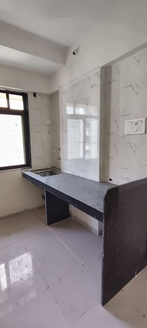 Kitchen in 1 BHK Apartment at K M Horizon Palms, Owale – for Rent