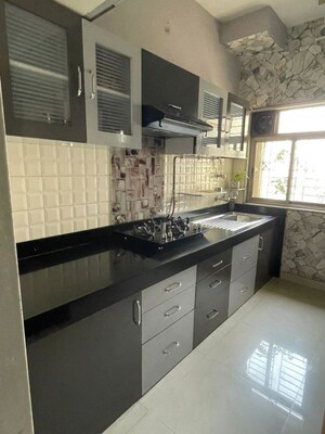 Kitchen in 2.5 BHK Apartment at Vijay Enclave, Waghbil – for Rent