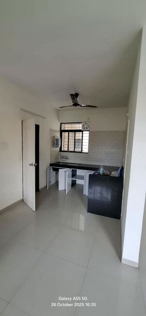 Kitchen in 2 BHK Apartment at Kolte Patil Margosa Heights, Mohammadwadi – for Rent