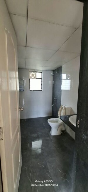 Bathroom in 2 BHK Apartment at Kolte Patil Margosa Heights, Mohammadwadi – for Rent