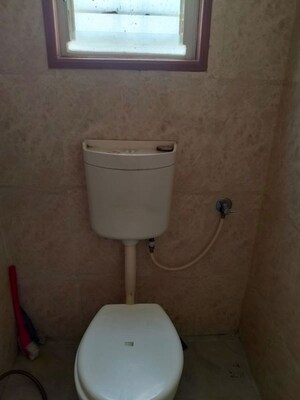 Bathroom in 2 BHK Apartment at Nirmana Enclave, Dehu Road – for Rent