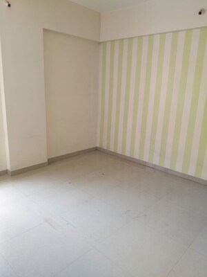 Room in 2 BHK Apartment at Nirmana Enclave, Dehu Road – for Rent