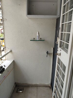 Balcony in 2 BHK Apartment at Nirmana Enclave, Dehu Road – for Rent