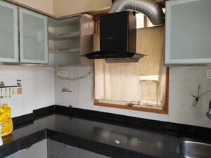 Kitchen in 2 BHK Apartment at Nirmana Enclave, Dehu Road – for Rent