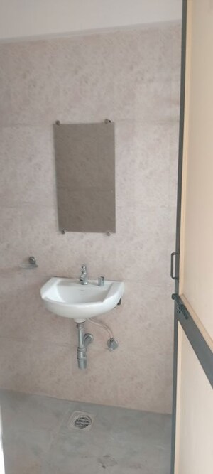 Bathroom in 2 BHK Apartment at Nirmana Enclave, Dehu Road – for Rent