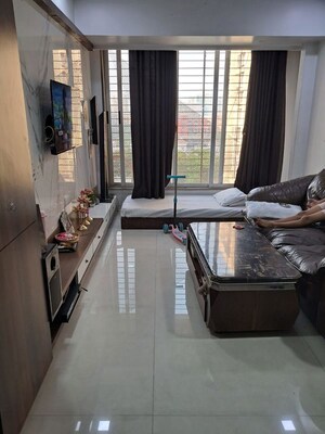 Living Room in 2 BHK Apartment at Akash Ganga CHS Nerul, Nerul – for Rent